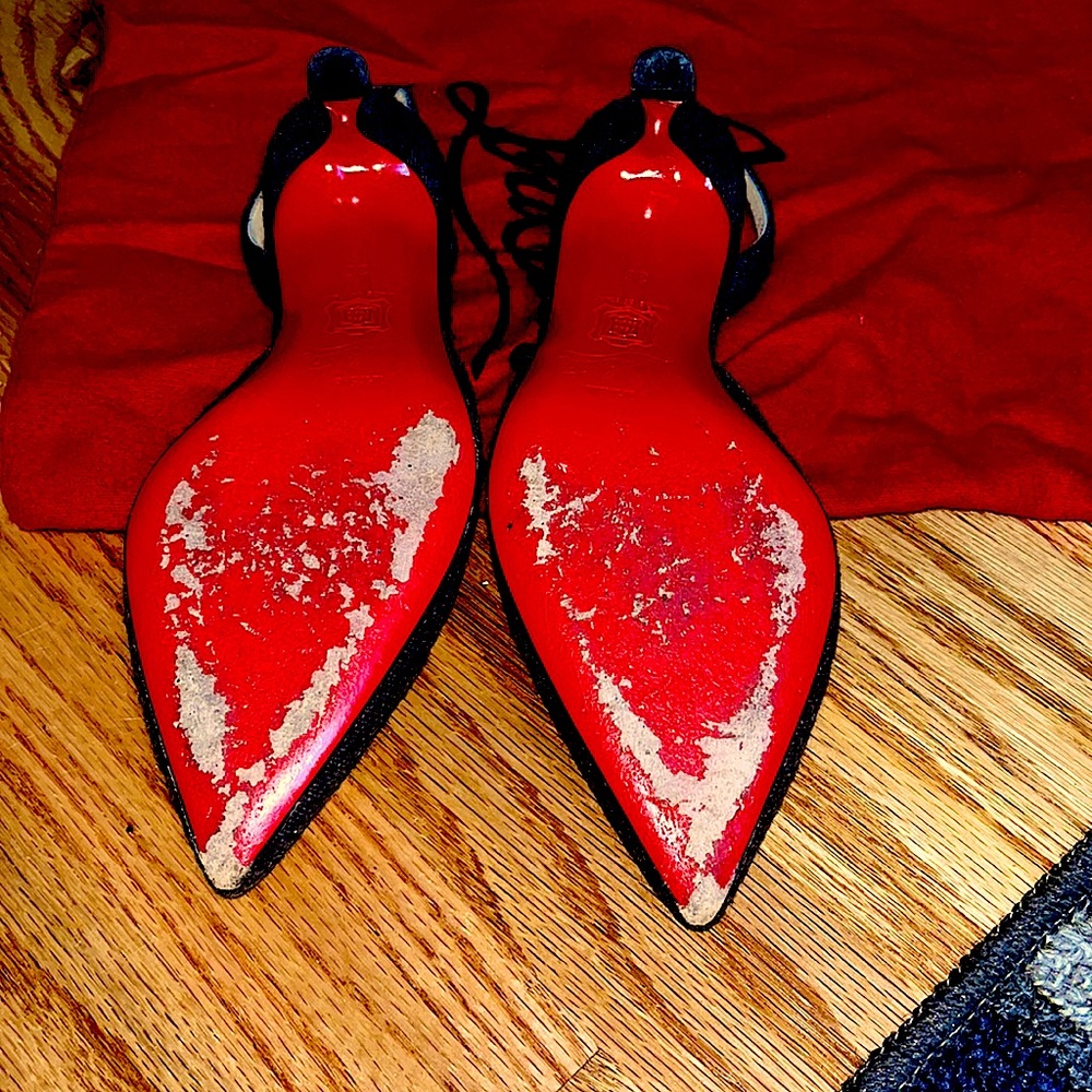 SHARKA FLANNEL CHRISTIAN LOUBOUTIN- worn once